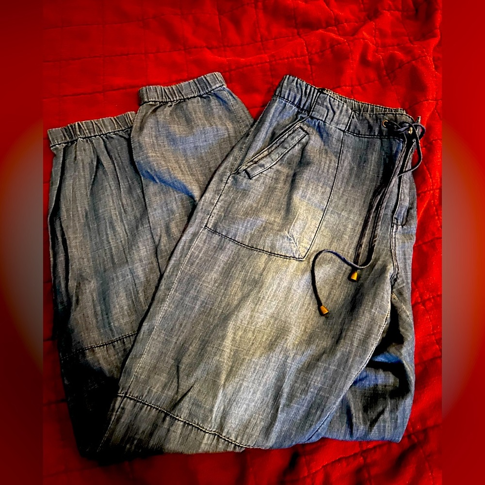 Medium wash jogger jeans.